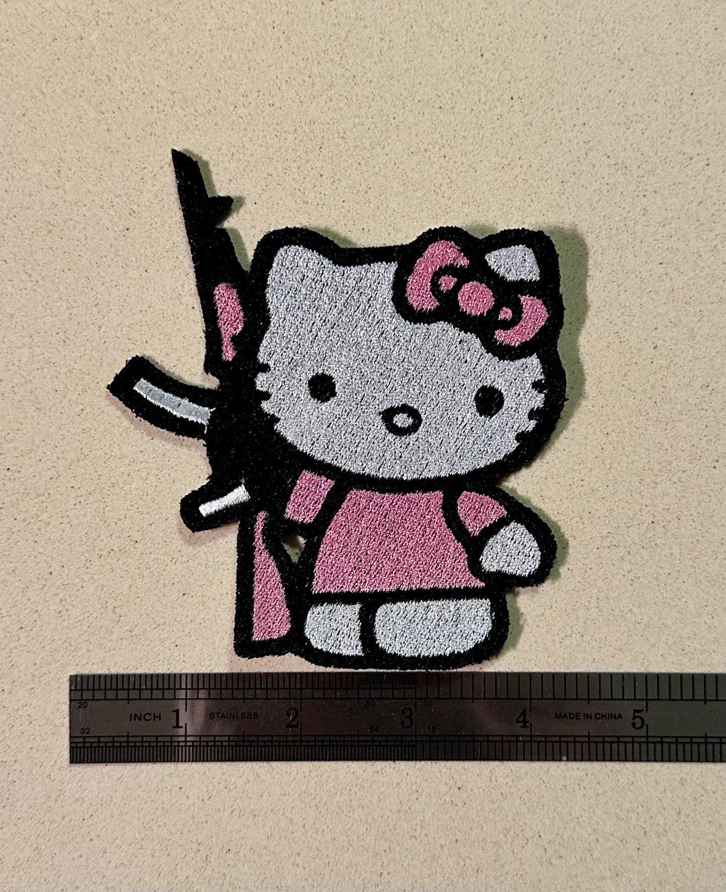 Kitty with an Ak47 patch