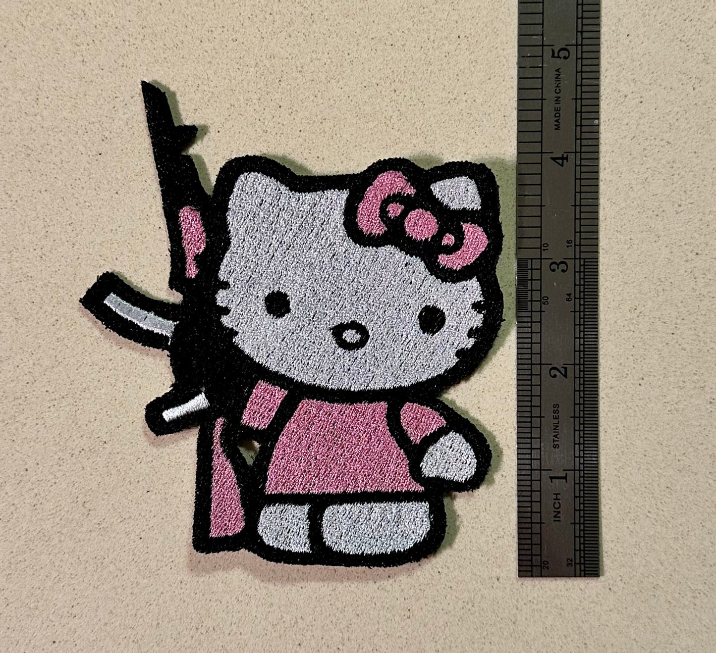 Kitty with an Ak47 patch