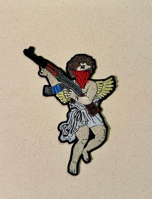 Guardian angel with an AK patch ￼